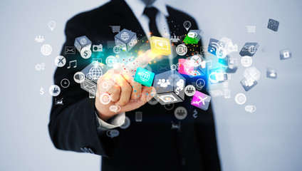 Businessman touching social icon. Social media concept