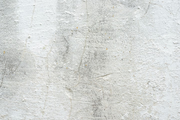 The texture of the whitewashed walls with cracks