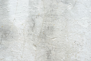 The texture of the whitewashed walls with cracks