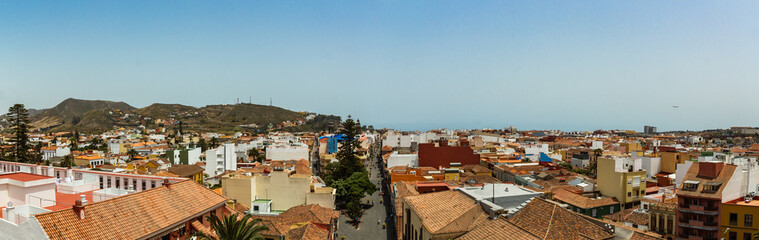 Aerial view of the historic town of San Cristobal de La Laguna in Tenerife showing the buildings and streets with mountains in the background