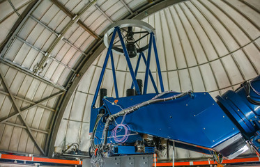 Tenerife, Spain - March 03, 2017. Newton Telescope of the Teide Astronomical Observatory, preparation for observations of the night starry sky..