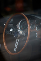 Wooden steering wheel of an old classic car