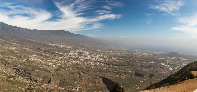 Aerial view of Valley Guimar, located in the district of Chacona. Beautiful sunny day and blue sky above the horizon. Tenerife, Canary Islands. Spain