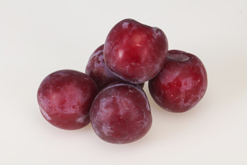 Sweet ripe plum isolated on white