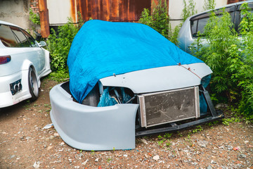 The photo of the broken thrown car