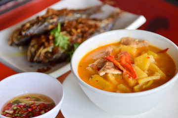 Southern Thai Spicy Sour Yellow Curry with pork and pineapple