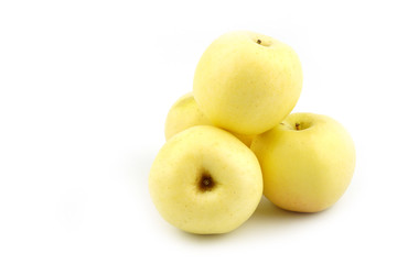 Four Golden apple fruit isolated on white background