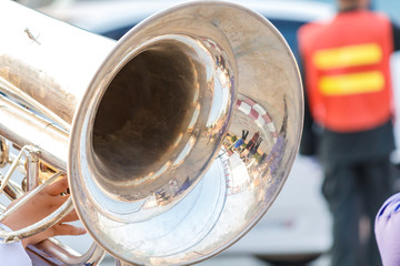 Close up and details of playing musicians, instruments in a marching, show band, music band