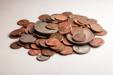 pile of coins isolated on white background