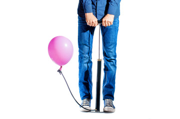 a man with a pump is pumping a balloon