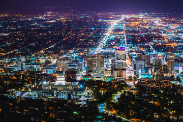 Salt Lake City night view illuminated with lights at night after sunset, in Salt Lake City, mountain view