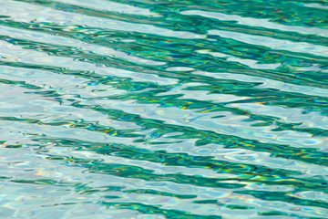Waving, blue water surface.