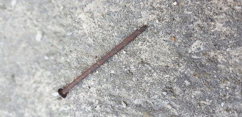 nails on wooden background