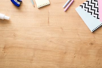 School supplies on wooden desk table background. Back to school concept. Flat lay, top view. - Powered by Adobe