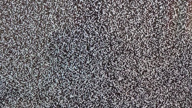 4k footage of black and white tv static with sound