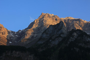 Naklejka premium Peak of Mount Glaernisch at sunset, Switzerland.