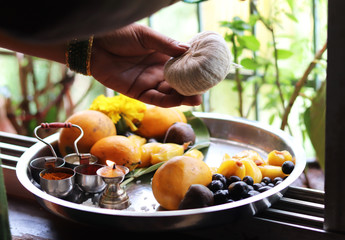Female Worship Hands on Indian Traditional Holy Dish