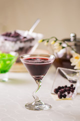 Cocktail of currant fresh berries on the table