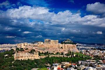 Fototapeta na wymiar View ot the Acropolis of Athens from Philopappos or Filopappou hill. You can see the Parthenon and under the Acropolis left the Odeon of Herodes Atticus.