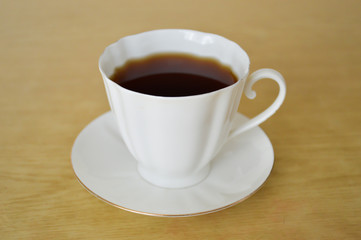 cup of tea on wooden table