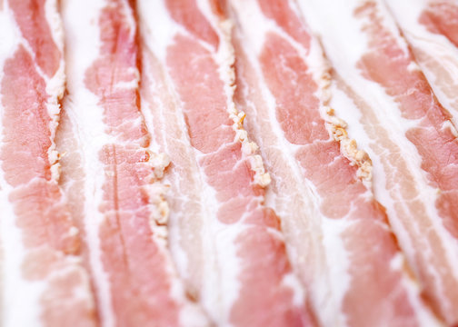 Slices of bacon, salt-cured pork