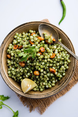 Hariyali sabudana khichdi is a delicious twist to the regular Sago khichadi made using cilantro , chillies and groundnuts