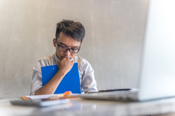 Stressful man suffering with financial report and deadline