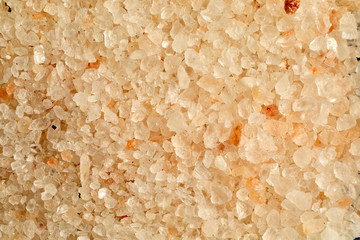 Coarse granules of red Indus hill salt, Pakistan