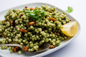 Hariyali sabudana khichdi is a delicious twist to the regular Sago khichadi made using cilantro , chillies and groundnuts