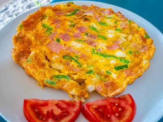 omelette with vegetables and tomato for energetic and healthy Mediterranean breakfast