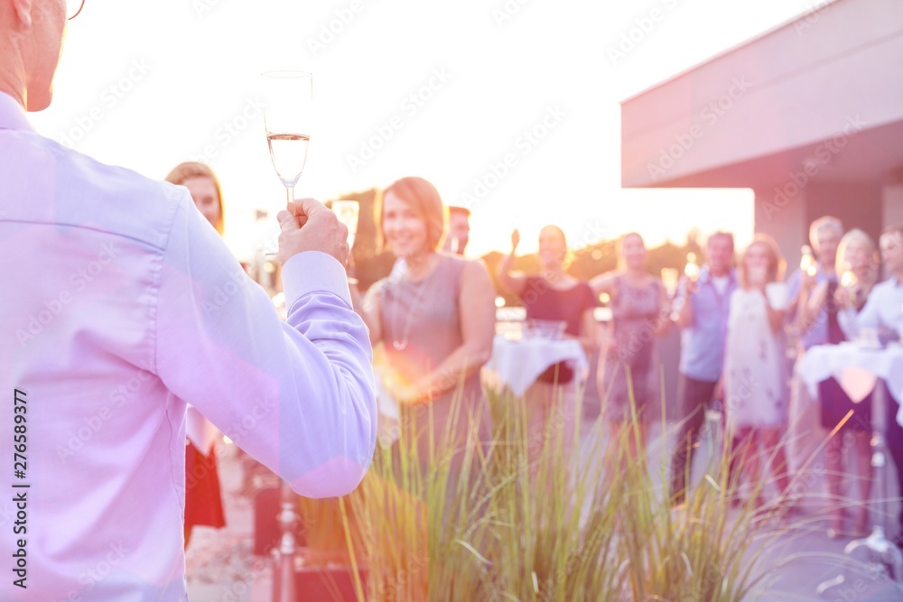 Poster business people on a rooftop party.