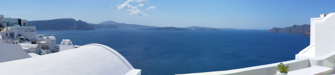 Panoramic view of Oia, Santorini island, Thira, Cyclades islands, Greece.