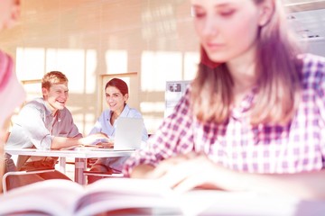 Students at university library