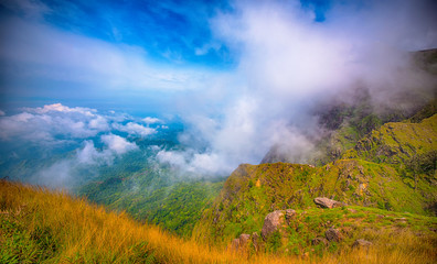 Landscape of Green mountains and beautiful sky clouds under the blue sky, Dramatic moving cloud in nature landscape, Sunshine morning. - Image