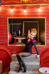 Circus girl acrobat gives an presentation. Incredible possibilities of the human body. Flexible...