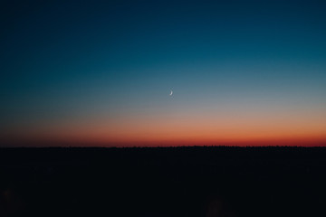 Late evening sky and landscape. Calm summer scenery night. Camping in wilderness. Sunset, sunrise in park. Scenic, picturesque view backdrop, background. Wild forest at nighttime