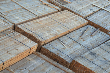 Wood planks stacked and prepared for transportation