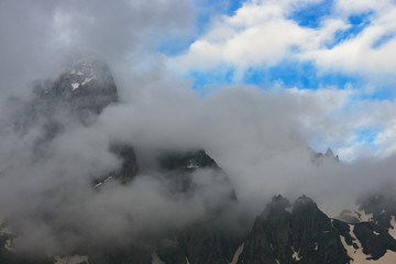 Rocky mountains in the clouds. Caucasus, Georgia