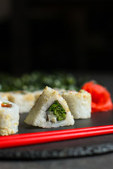 Sushi maki rolls (tuna, salmon, shrimp, avocado and other ingredients). japanese food. Top view, assorted sushi, all you can eat menu. copy space