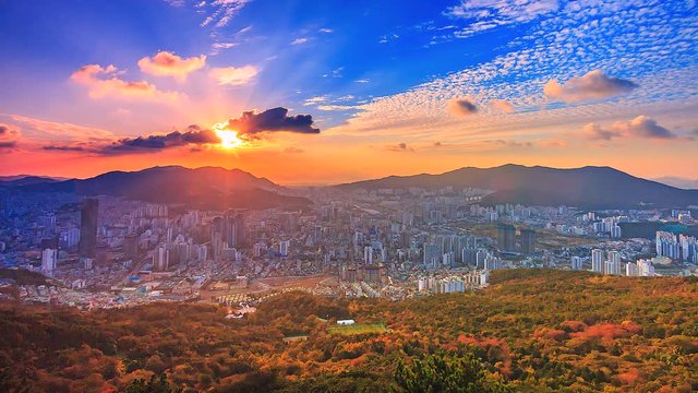 4K.Time lapse View sunset of Busan city cityscape South Korea
