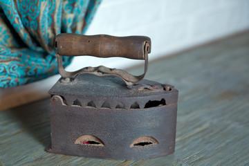 Old iron on wood wall . Antique iron , Old iron ,