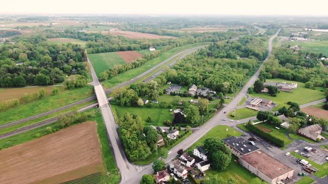4K Aerial drone footage flying over Village of Oregon and Route 222 in rural countryside of Lancaster County, Pennsylvania
