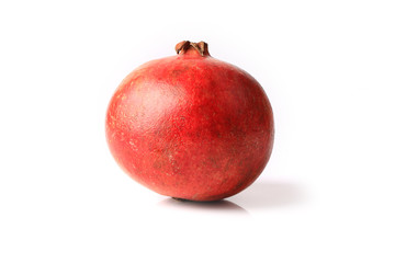 whole pomegranate isolated on white background