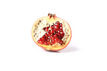 pomegranate cut in half isolated on white background