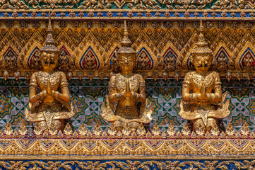 Mosaic encrusted wall of the Phra Mondop library building on the grounds of the Grand Palace Bangkok Thailand.