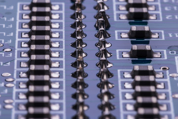 Selective focus of computer motherboard chip and other details.