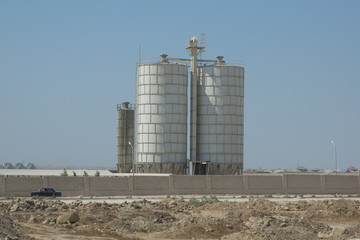 Obraz premium Cement manufacturers mine and process raw materials and put them through a chemical reaction process to create cement . Sand and stone destined to the manufacture of cement in a quarry.