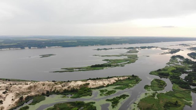Aerial view. Wild nature. Dniper river and wetlands near Kyiv, Ukraine.  4K