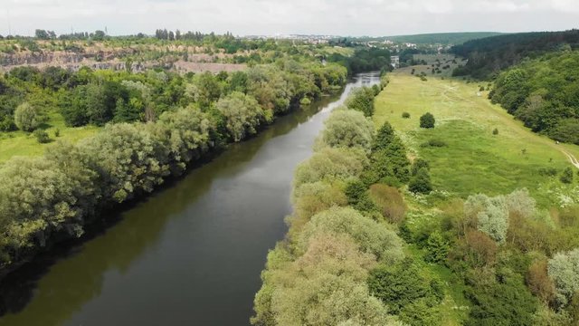 Drone Shot of a River  in Temperate Climate Zone. Europe, Ukraine, Vinnytsia. Aerial. Pivdenny Buh.
