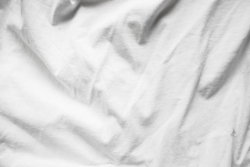 texture background cotton folds of white fabric